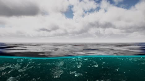 Split-view-over-and-under-water-in-the-Caribbean-sea-with-clouds